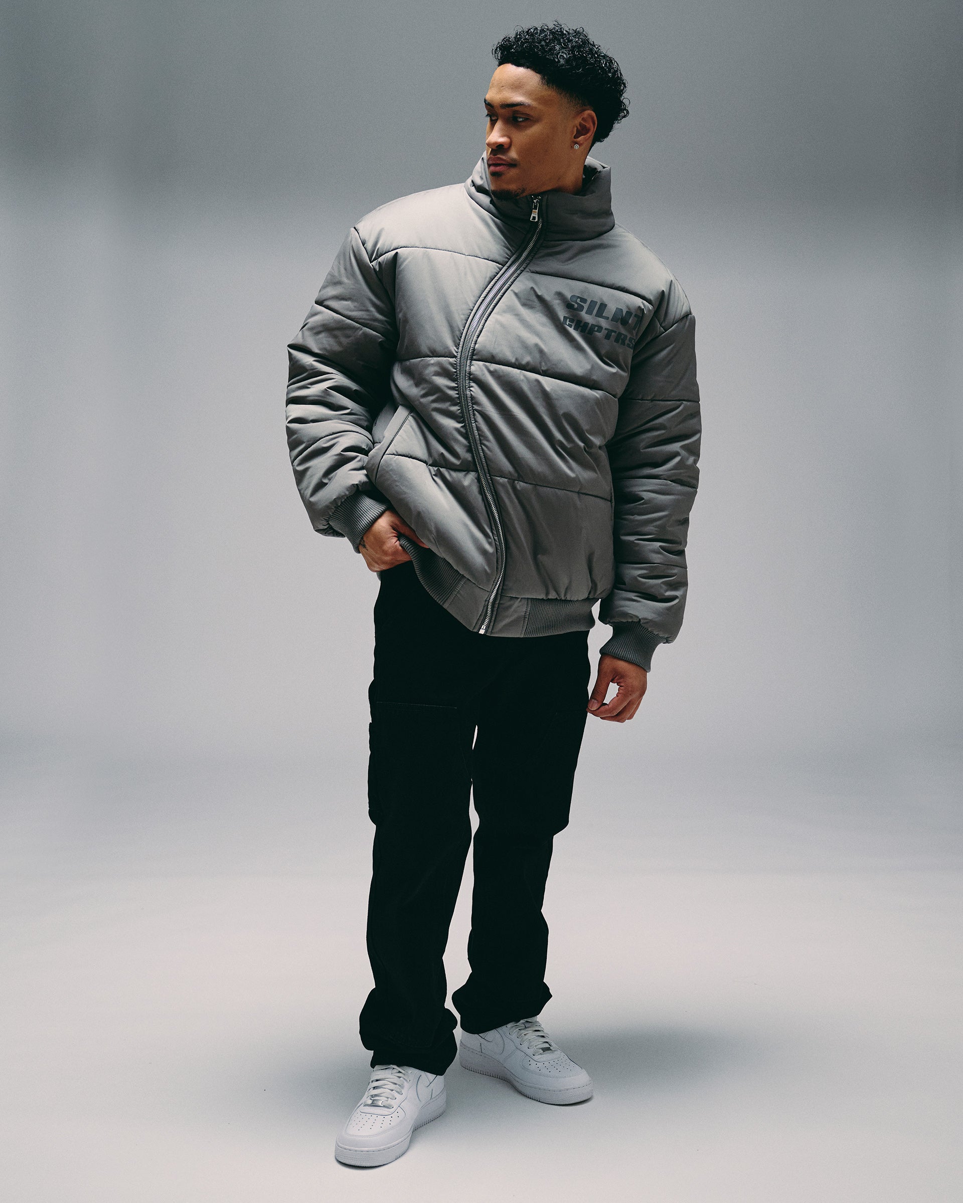 Silnt Chptrs Irregular Puffer Jacket - High Collar