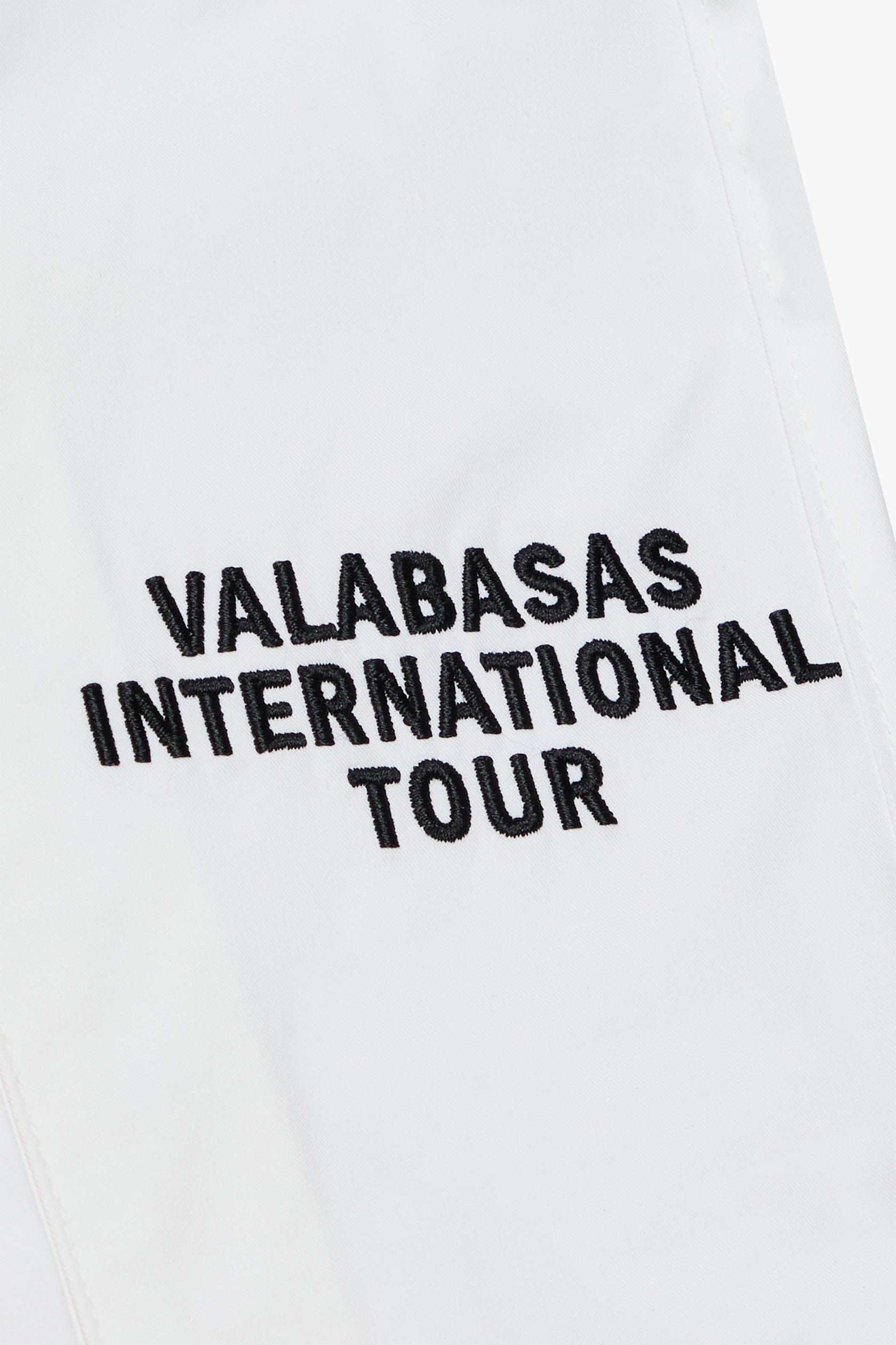 "TOUR" WHITE CROP BUTTON DOWN WHITE