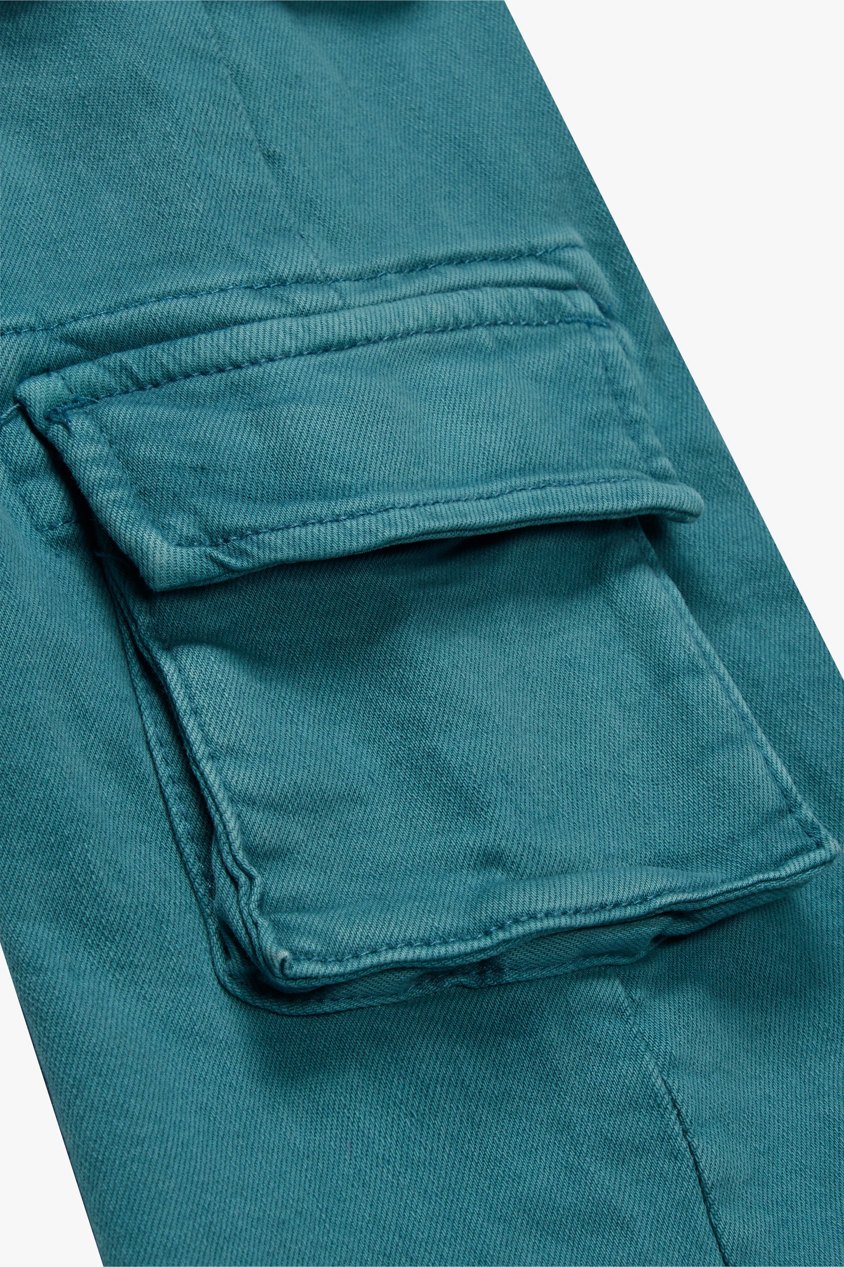 "PINNACLE” AQUA STACKED FLARE JEAN